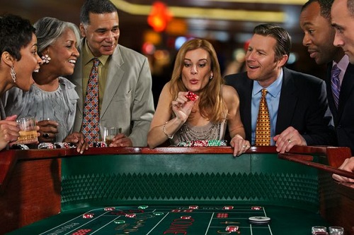 image of people at craps table online craps