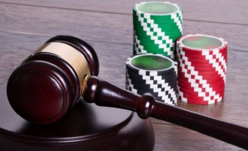 casino chips with judges gavel gambling law and gambling bill